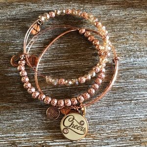 ALEX and ANI “Cheers” rose gold bracelets.